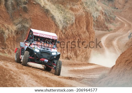 TERUEL, ARAGON/SPAIN - JULY 18: Spanish Driver, Jose Abril tries to get a good result in Prologue in Baja Aragon Rally on July 18, 2014 in Teruel