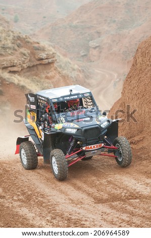 TERUEL, ARAGON/SPAIN - JULY 18: Spanish Driver, Isidre Esteve tries to get a good result in Prologue in Baja Aragon Rally on July 18, 2014 in Teruel