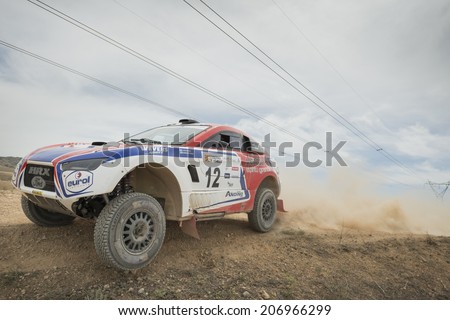 TERUEL, ARAGON/SPAIN - JULY 19: Argentinean driver, Lucio Alvarez, tries to get a good result on SS2 in Baja Aragon Rally on July 19, 2014 in Teruel