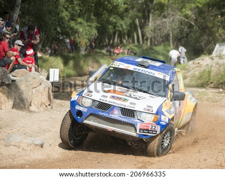TERUEL, ARAGON/SPAIN - JULY 19: Spanish Driver, Josep Maria Servia, tries to get a good result in SS1 in Baja Aragon Rally on July 19, 2014 in Teruel