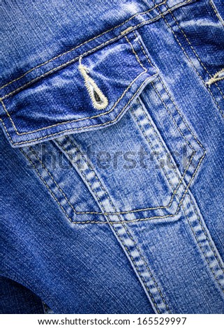closeup detail of blue vintage denim jacket