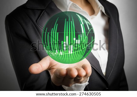 Business woman showing stock market candle graph analysis ball on hand palm.