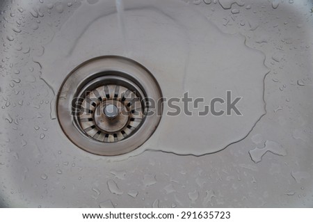 Water flows into the drain sink