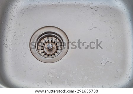 Water flows into the drain sink