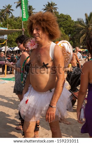 ARAMBOL, GOA, INDIA - FEB. 5: An unidentified man goes in Funny angel costume at the annual festival of Freaks on FEB. 5, 2013 in Arambol beach, Goa, India