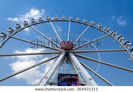 HAMBURG, GERMANY - AUGUST 03, 2015: Ferris wheel at the Hamburg Fair Ground Hamburger Dom