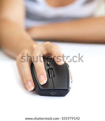 Wireless mouse and the middle finger rests on the right mouse button