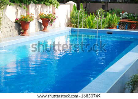 Swimming pool with clean blue water outdoor