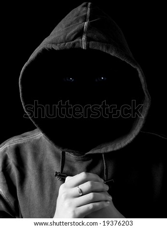 portrait of a dark man in a hood without face