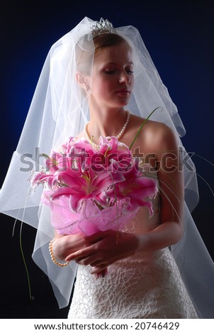 young bride with bouquet of lilys on a black background