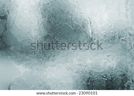 blue winter frosted window with beautiful tracery