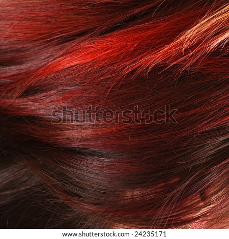 picture of a beautiful red dyed female hair