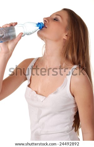 stock photo woman in wet white shirt with bottle of water