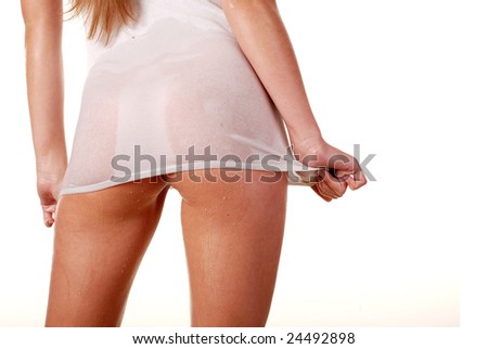 stock photo buttocks of a beautiful young woman in wet white shirt