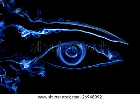 Human eye from blue smoke texture at black background