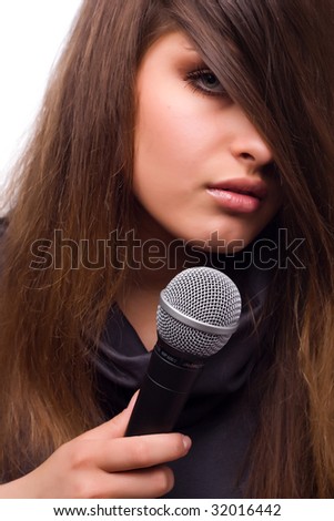 portrait of young beautiful woman with microphone