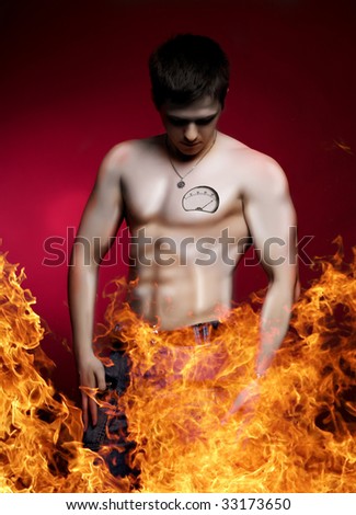 young attractive wax naked man in fire