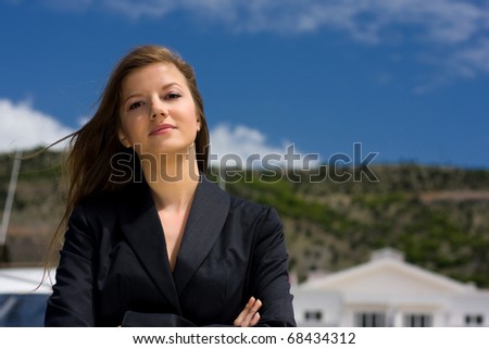 beautiful woman in a business suit with long straight hair