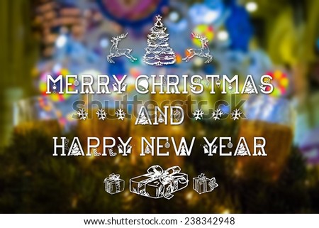 Merry Christmas and New Year hand drawing greeting card on blurred festive decoration background