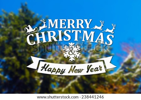 Merry Christmas and New Year greeting card on blurred spruce or fir-tree on blue sky background