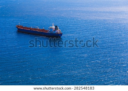 Empty container cargo ship in the open ocean or sea