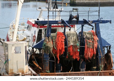 Fish boat or trawler in the harbor