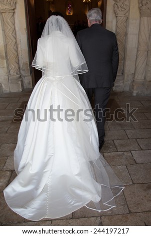 Bride and her father  at the church during a wedding
