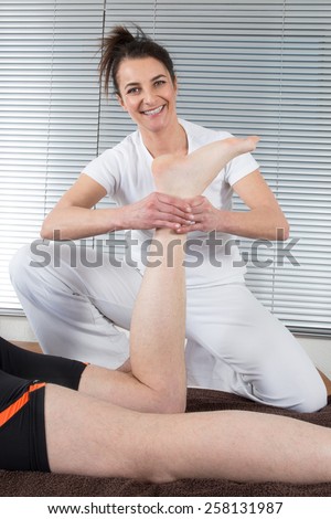 One man and woman performing shiatsu  massage