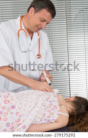 Male  doctor giving vaccination girl, health, prevention