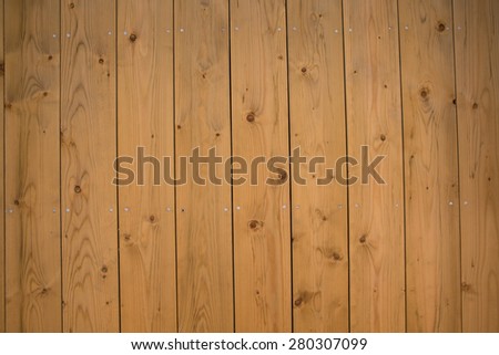 Weathered Wood Plank Barn Siding Background with Rusty Nail-heads.