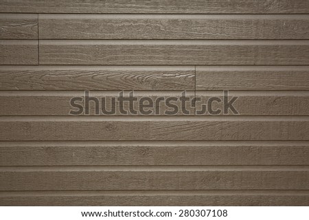 Weathered Wood Plank Barn Siding Background with Rusty Nail-heads.