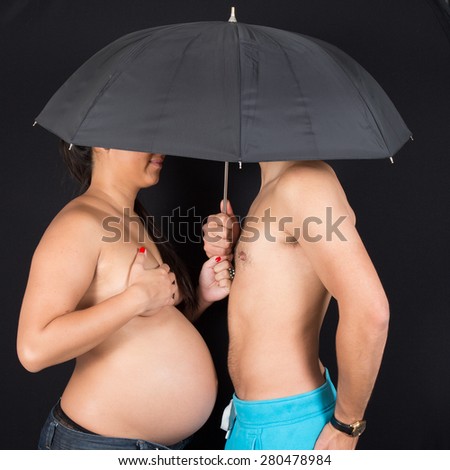 Picture of couple, expecting babies and happy to share it