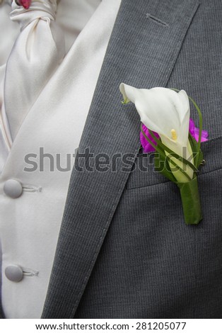 Flower on groom\'s jacket for a special day : wedding