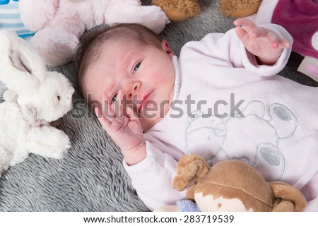 Close up of new born baby with cute expression