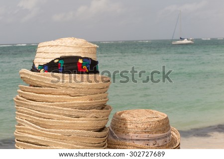 At summertime beautiful hat under ocean background