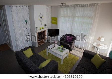 Modern, bright, clean, living room   in a  house