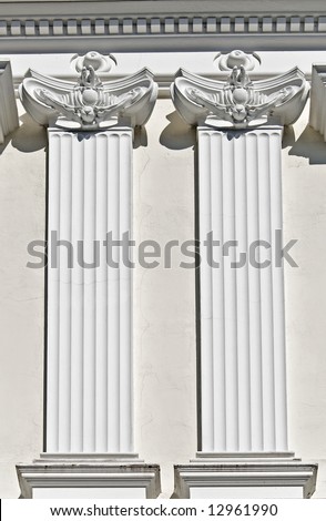 Two replica ancient greek pillars from a detail of a palace in Greece