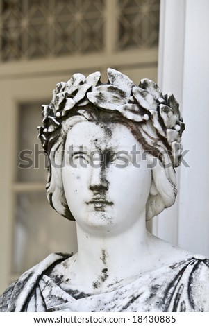 Ancient Greek statue outside of a temple. Achilleion palace, Corfu island, Greece