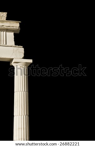 Ancient Greek pillar (part of a temple) in black background.