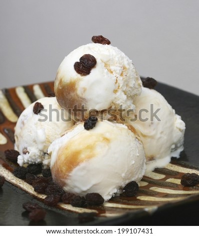 Home made vanilla ice cream with egg yolks, caster sugar, vanilla pods, double cream and malaga raisins