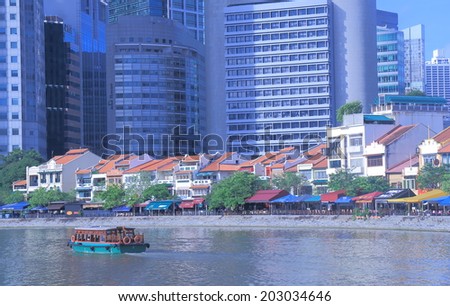SINGAPORE - 28 May, 2014: Boat Quay water front restaurants. Boat Quay is a popular outdoor dinning area along the Singapore river.