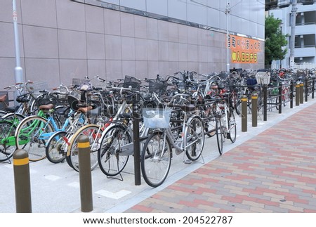 OSAKA JAPAN - 3 JUNE, 2014: Bicycle parking. Bicycle is a key part of transportation and everyday life in Japan.