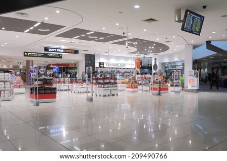 MELBOURNE AUSTRALIA - May 24, 2014: Unidentified people shop at Melbourne Airport duty free shops - Melbourne Airport is the primary airport serving Melbourne and hub for Qantas airlines