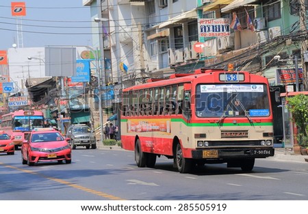BANGKOK THAILAND - APRIL 21, 2015: Old bus drives through Bangkok city centre. Buses are one of the key public transportation in Bangkok.