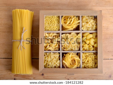 Box of wood with pasta on the wood table