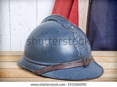 french helmet of World War I  and old french flag