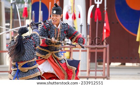SUWON, SOUTH KOREA - October 30, 2014 : Korean soldier with traditional Joseon dynasty during show martail arts at Hwaseong haenggung square. Photo taken on October 30, 2014 in Suwon, South Korea