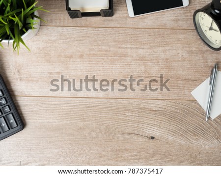 Top view of wooden working table. Businessman, office worker of student desktop. High angle view. Copy space.