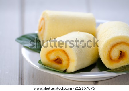 Close-up roll cake in the white plate