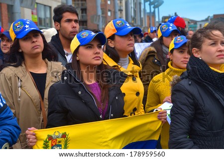 DUBLIN, IRELAND - FEBRUARY 22: Unidentified protesters rallying against Venezuela\'s President Nicolas Maduro on February 22, 2014 in Smithfield Plaza, Dublin, Ireland.